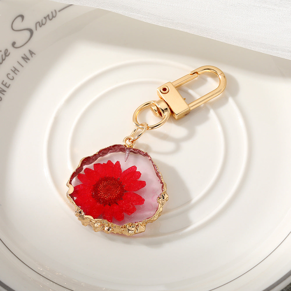 Wholesale Creative Frosted Epoxy Dried Flower December Flower Keychain